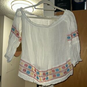 Rebellion White Blouse with Colorful Geometric Trim